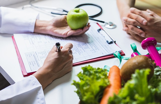 doctor prescribing healthy food